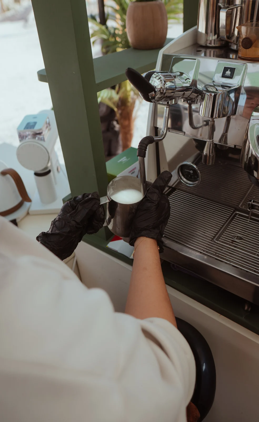 Barista at the espresso machine