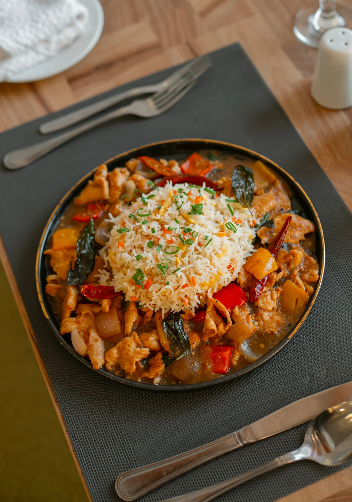 A richly garnished restaurant dish
